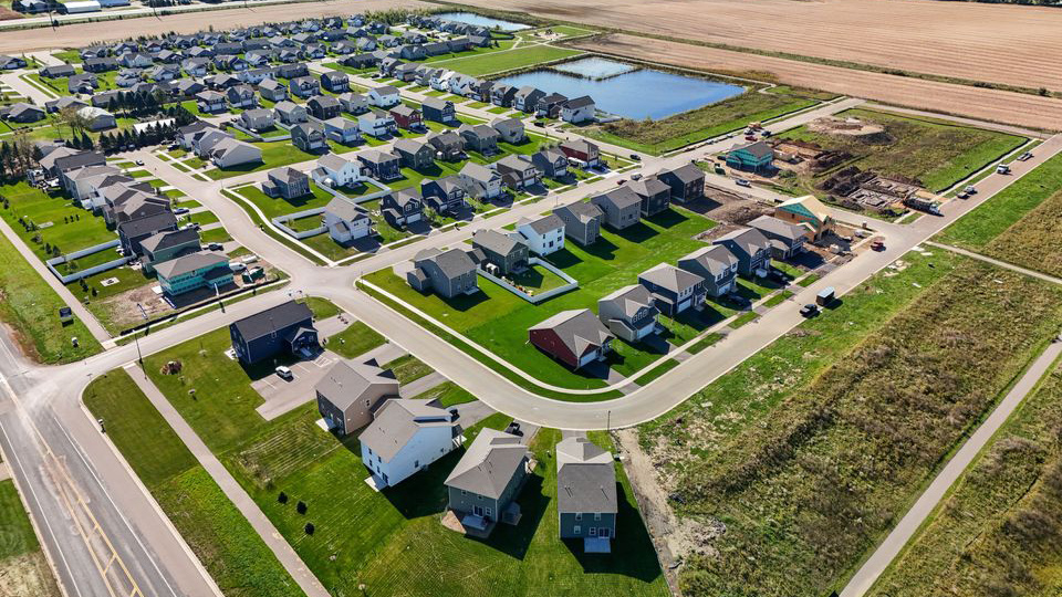 Aerial photos of homes for sale in Whispering Fields in Farmington, Minnesota.
