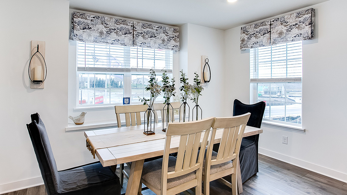 Dinette area staged with 6-person dining room table.