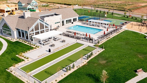 aerial view of the clubhouse, pool and playground.