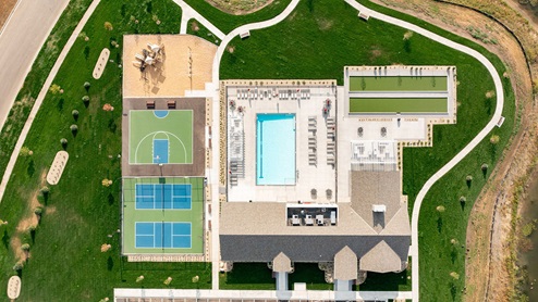 aerial view of the clubhouse, pool and playground.