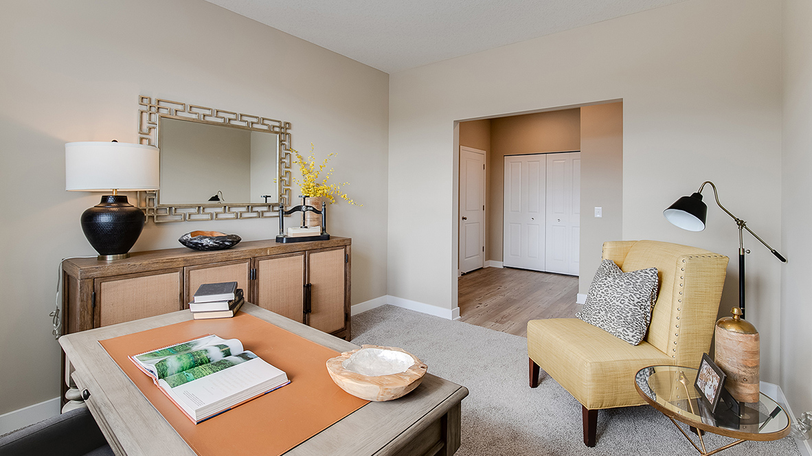 Secondary bedroom staged as home office.