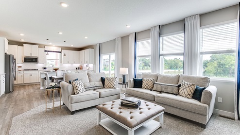 The main level is open from the family room to the dining area and kitchen.
