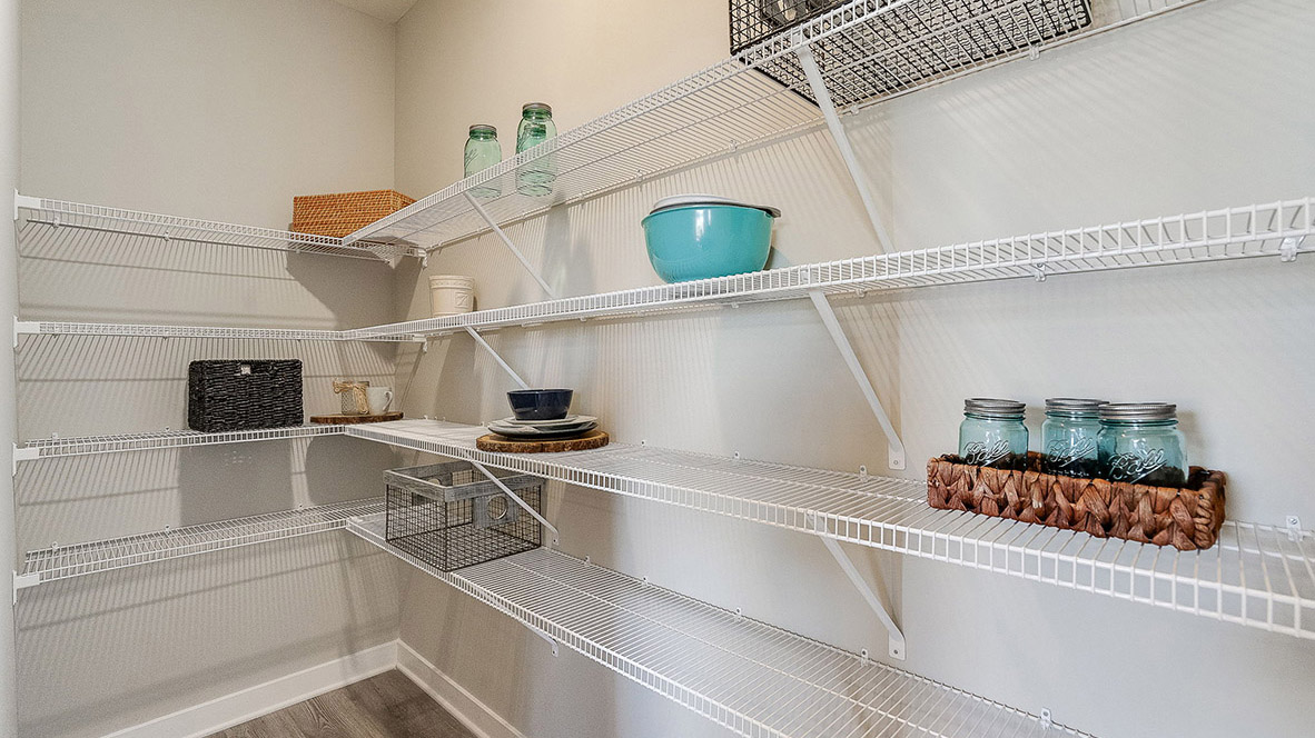 The kitchen has a walk in pantry.