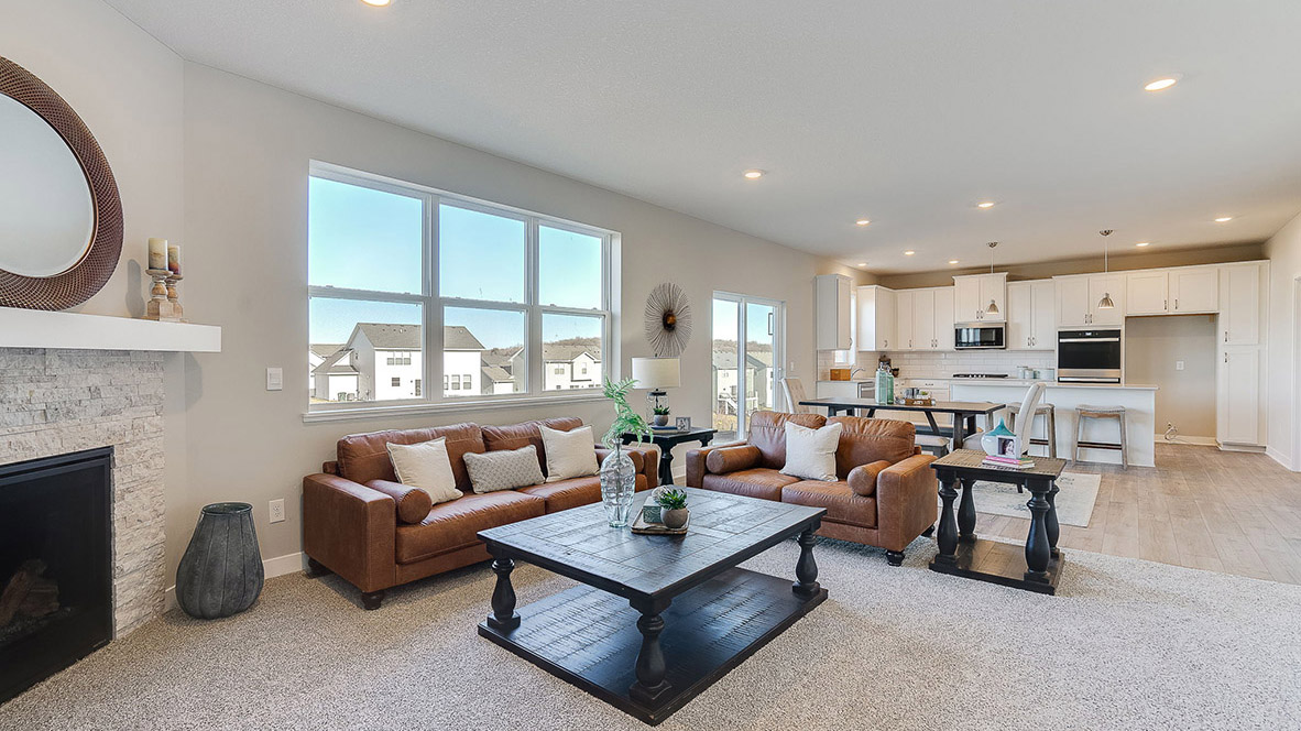 Open floor plan from the family room to the dining and kitchen areas.