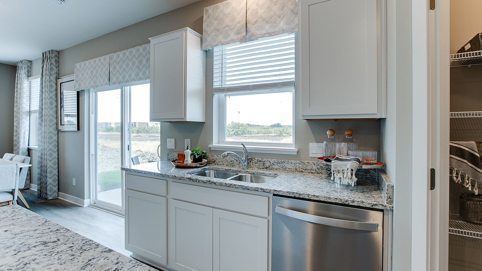 View of stainless steel dishwasher in kitchen