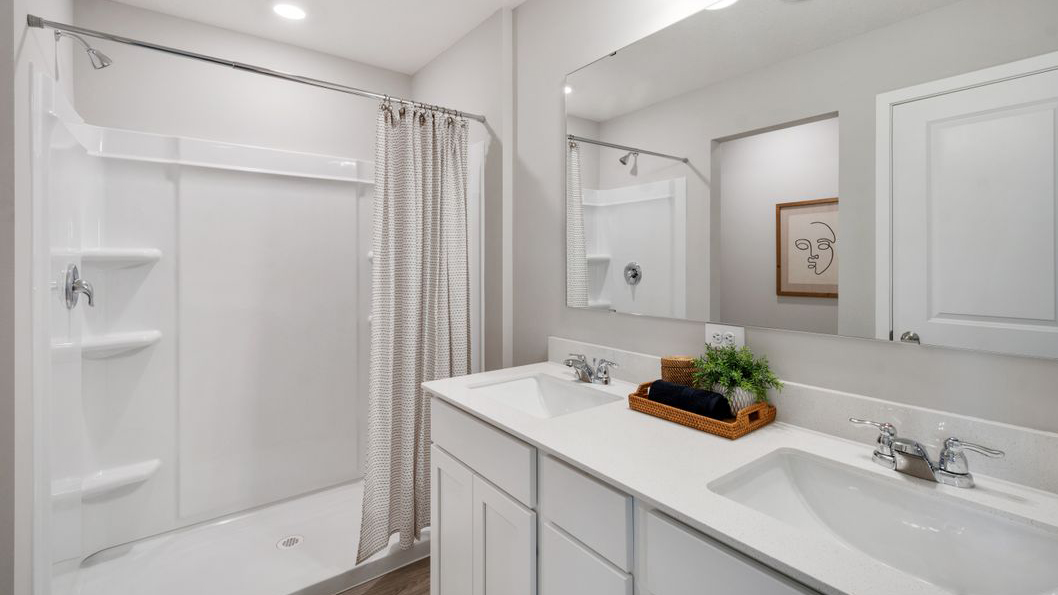 Owner’s ensuite adds quality storage inside this walk-in closet, designed for functional privacy Brookshire By D.R. Horton