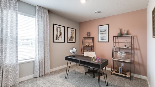 Home office with desk and chair.