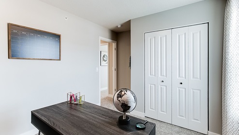 Home office with desk and chair.