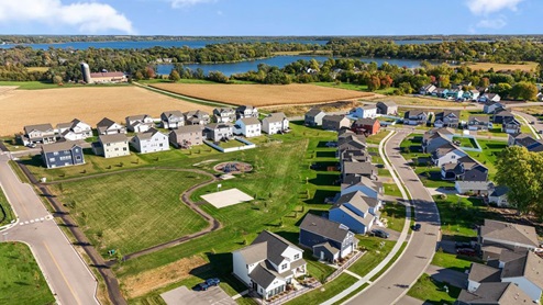 Community with a park and ball court.