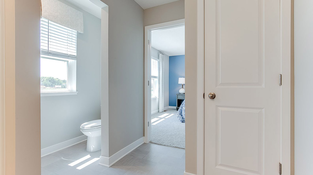 Private bathroom connected to bedroom suite.