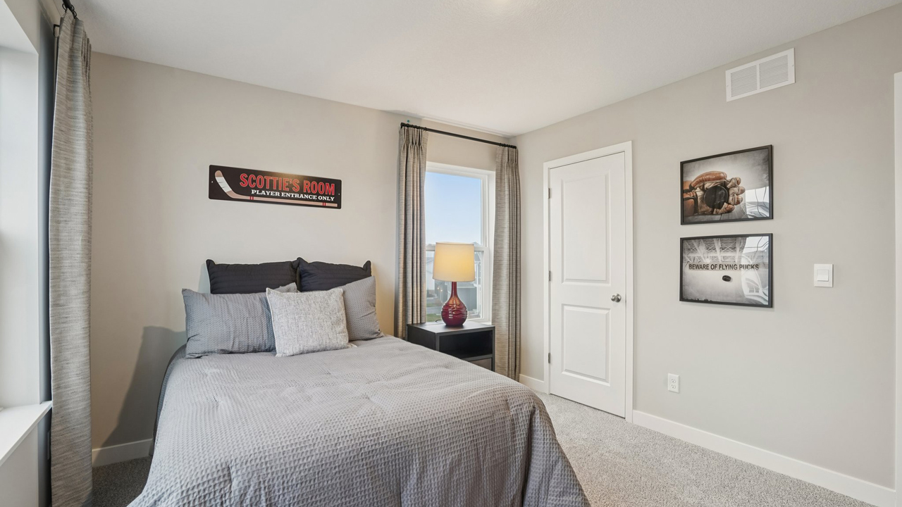 Secondary bedroom on the upper level.