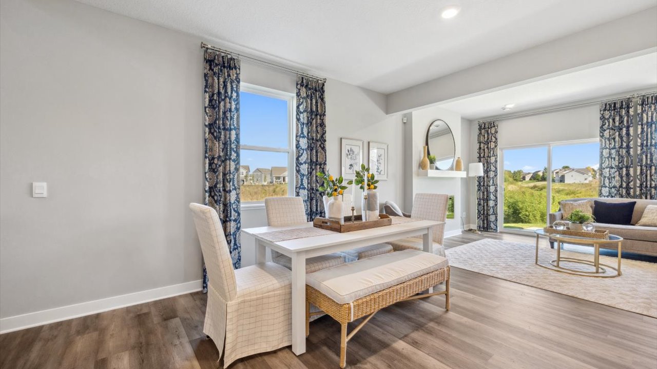 View of dinette area adjacent to living room.