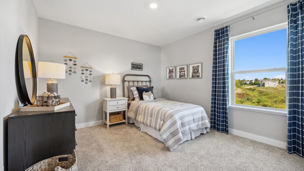 Secondary bedroom with standard closet.
