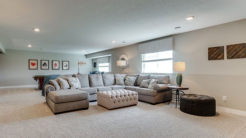 Finished lower level family rooms in homes at Springview Meadows in Prior Lake, Minnesota.