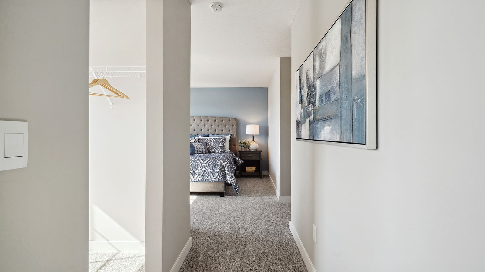 Hallway leading into bedroom suite.