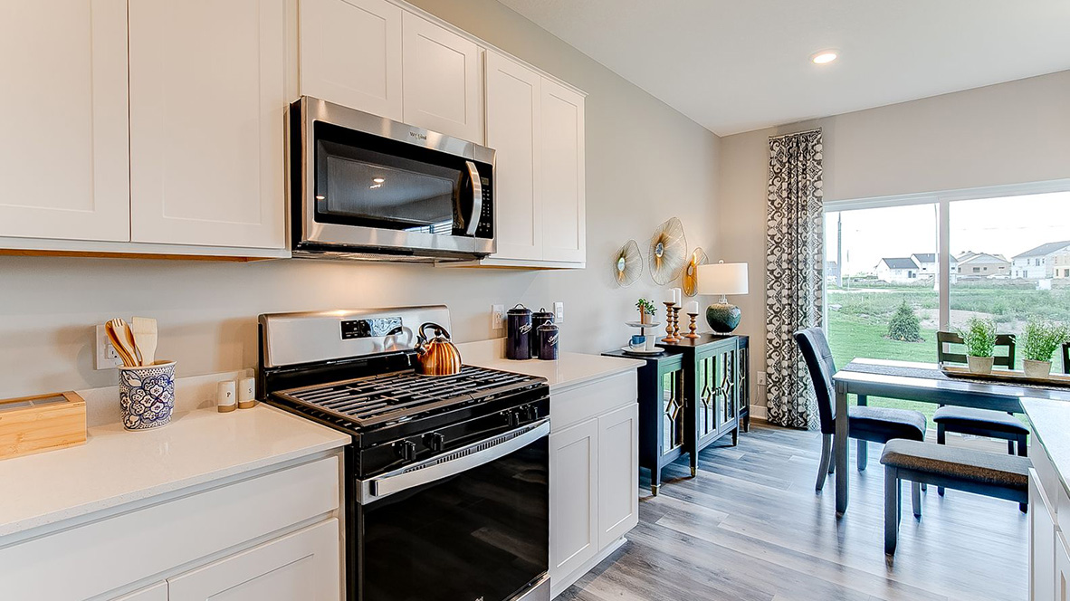 View of stainless steel Whirpool appliances.
