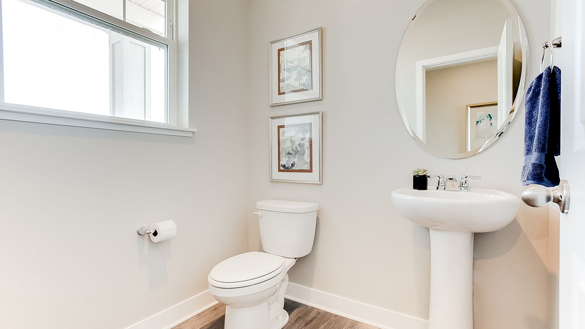 Main level half bathroom.