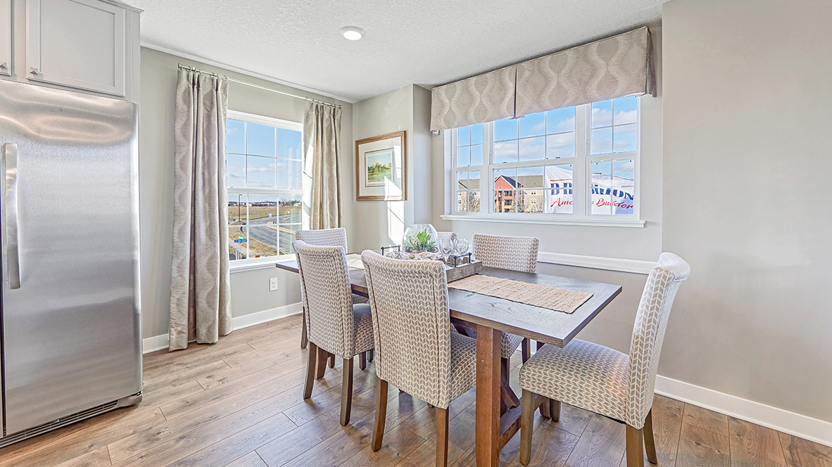 Dinette area staged with 6-person dining room table.
