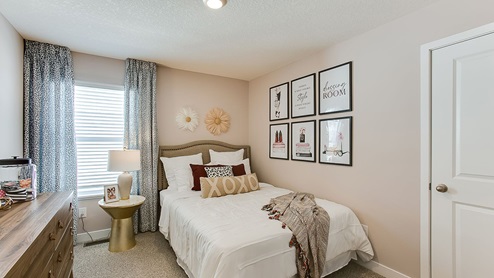 Secondary bedroom on the upper level.