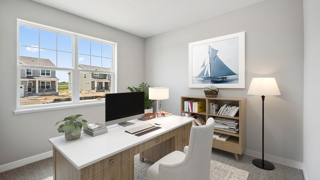 bedroom with beige carpet, grey walls and a window