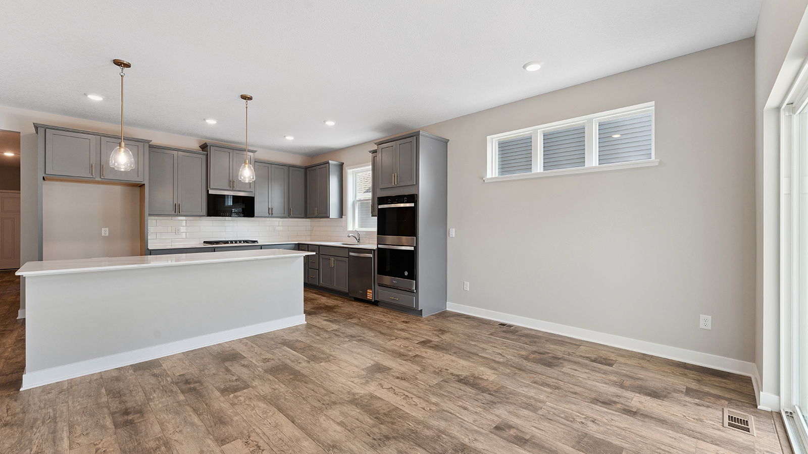 Interior living area open to kitchen with center island