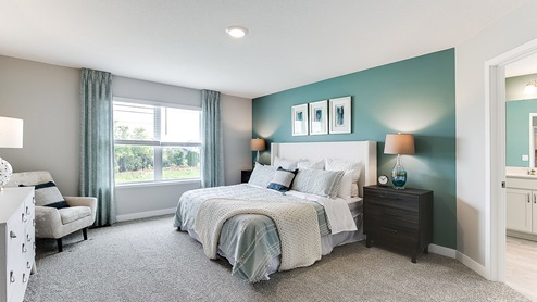 the bedroom suite is very open and leads into the private bath and two walkin closets.