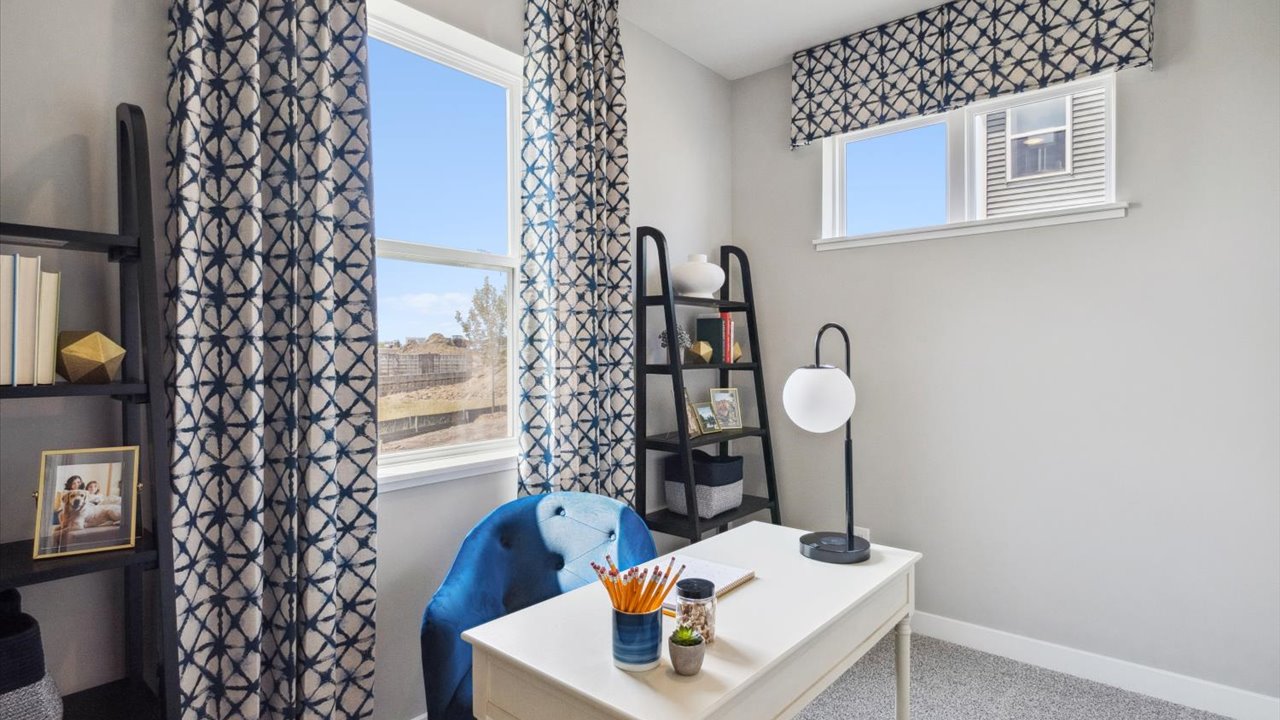 Home office with desk and chair.