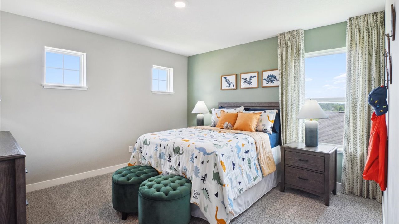 Secondary bedroom with natural lighting.