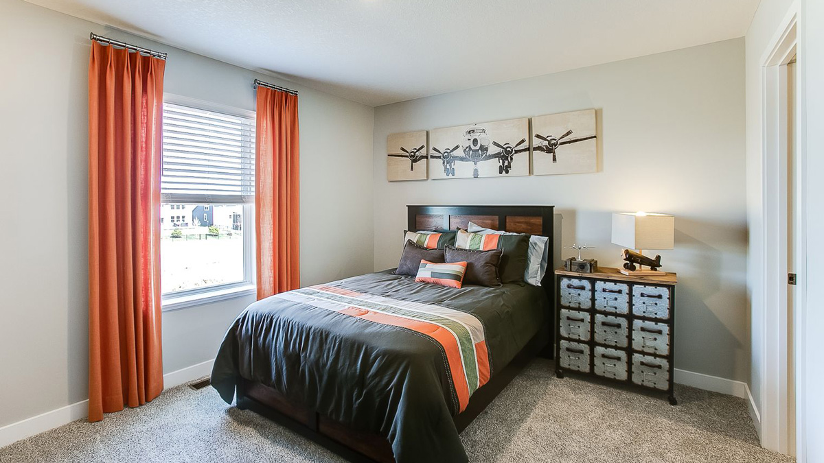 Secondary bedroom with walk-in closet.