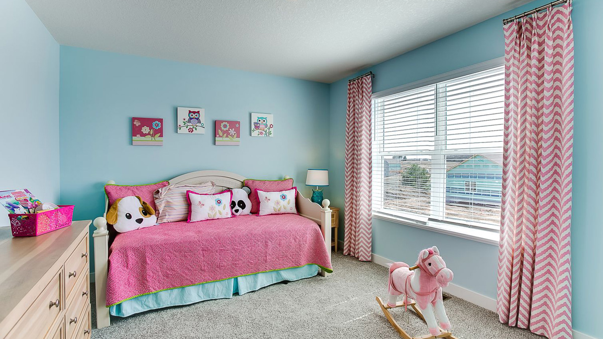 Secondary bedroom with walk-in closet.