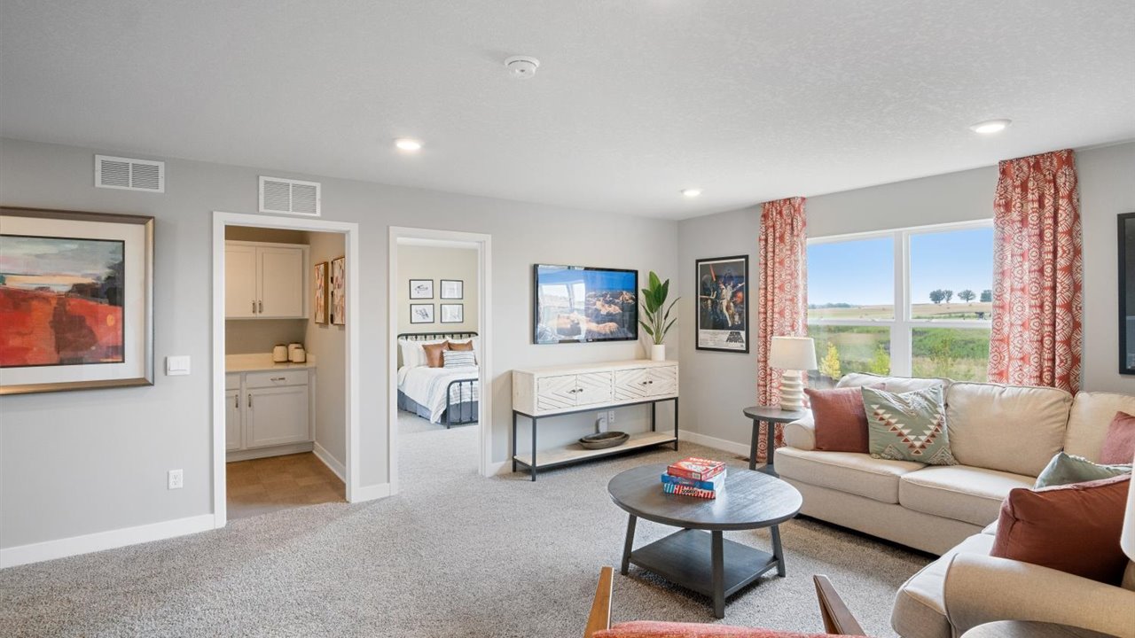 Upper level has 4 bedrooms, laundry room and a loft.