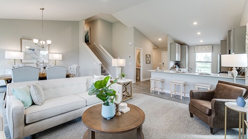 View from the family room into the dinette and kitchen.