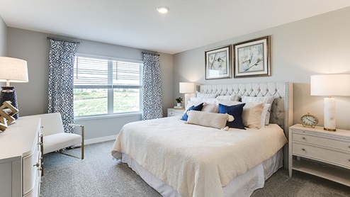 The bedroom suite has a private bath and walkin closet.