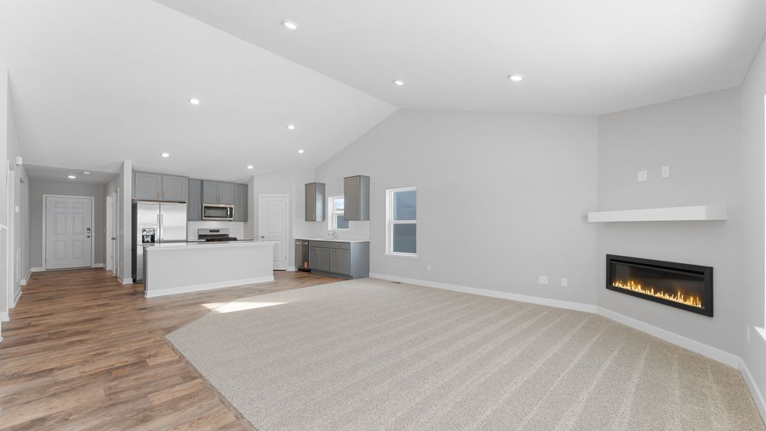 Empty living room with electric fireplace