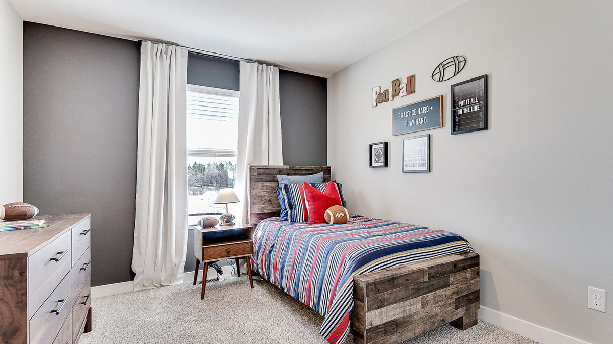 Secondary bedroom with standard closet.