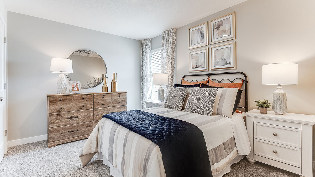 Secondary bedroom with standard closet.