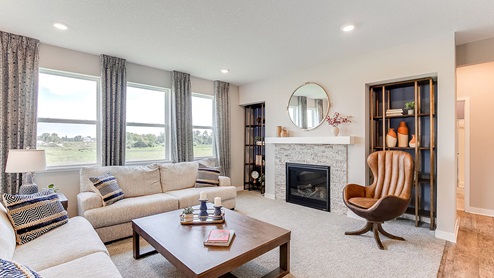 An optional gas fireplace is included in the model home and makes the family room look warm and inviting.