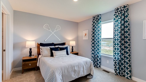 Secondary bedroom on the upper level.