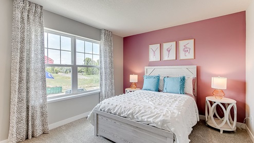 Secondary bedroom on the upper level.