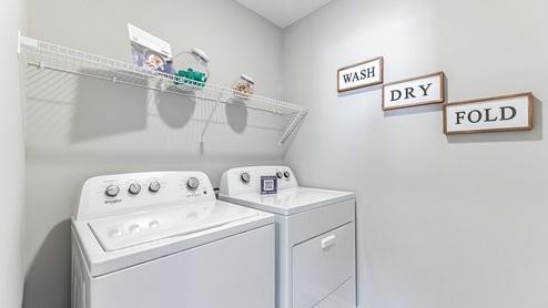 Upper level laundry room.