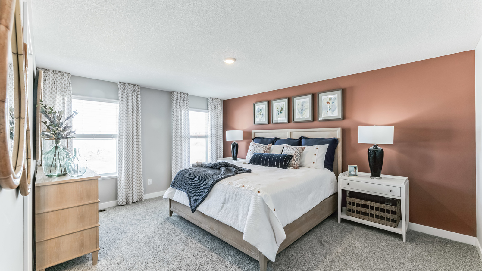 Bedroom suite with private bathroom and walk-in closet.