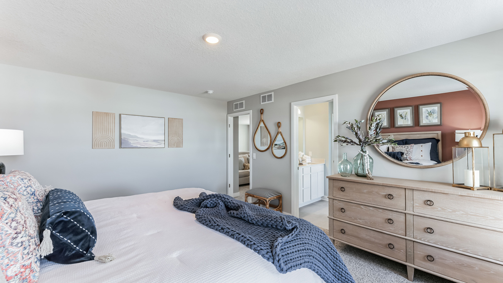 Bedroom suite with private bathroom and walk-in closet.