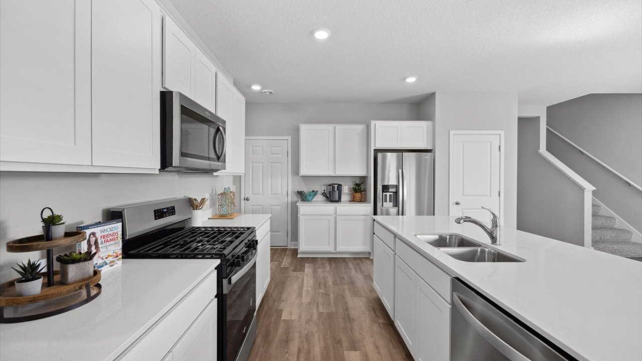Side view of kitchen counters and island.