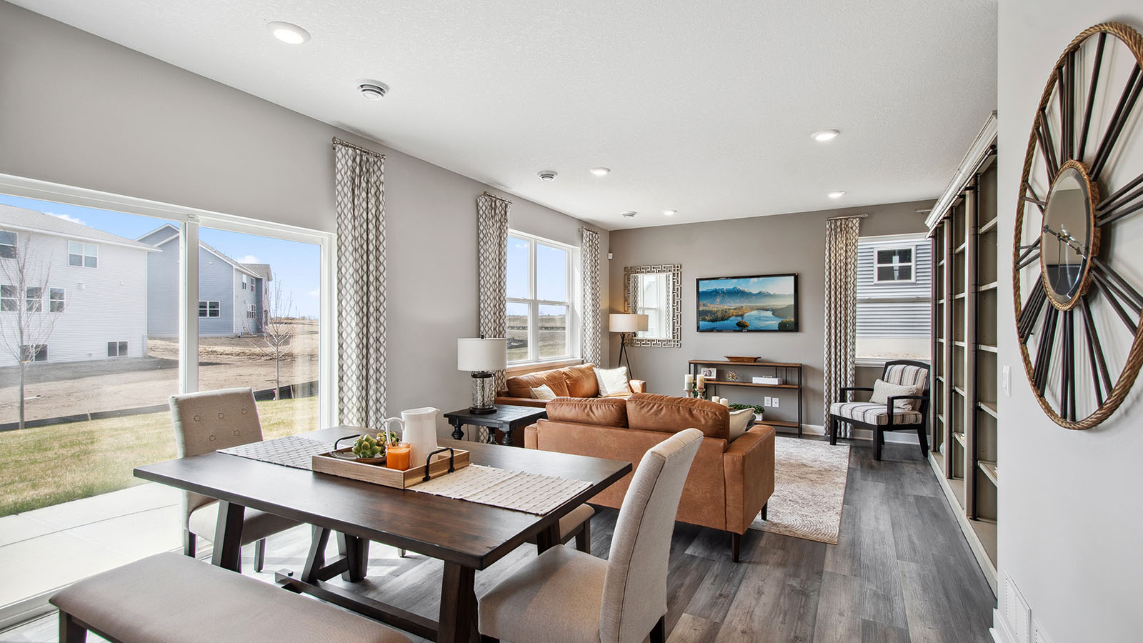 View of open concept main level with dinette in foreground