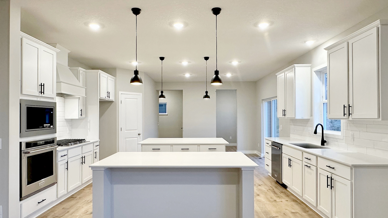 Kitchen with white cabinets.