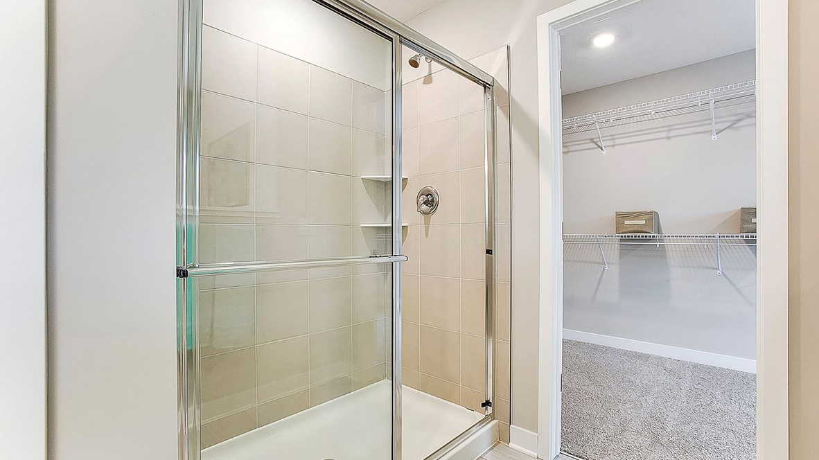 Private bathroom with separate shower and soaking tub.