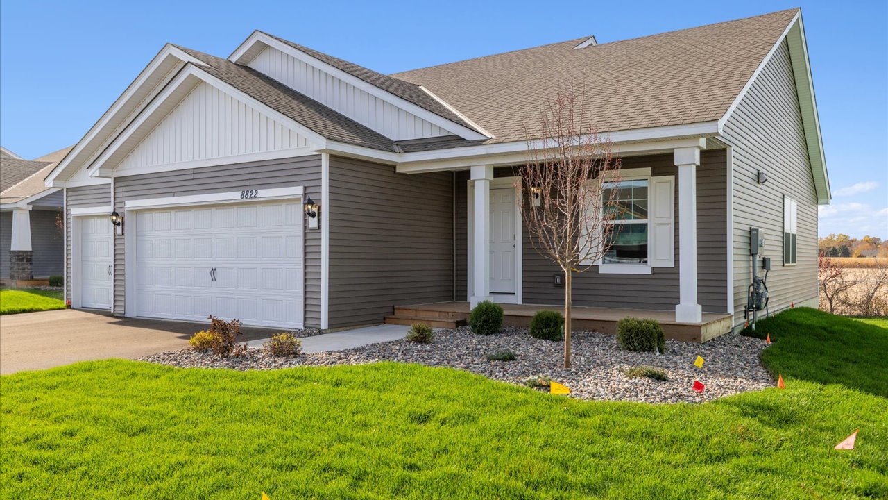 Street view of Rushmore home available in Ravine Crossing new construction neighborhood.