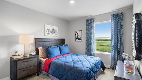 Upper level secondary bedroom.