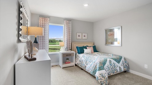 Upper level secondary bedroom.