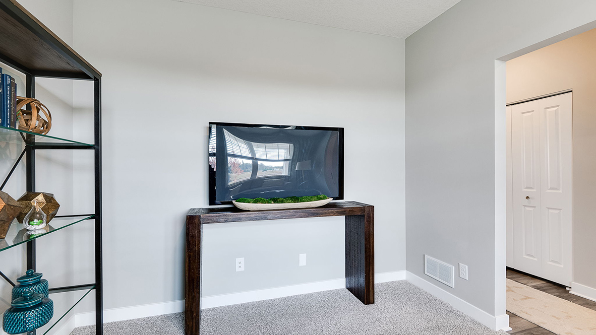 Main level study room facing street.